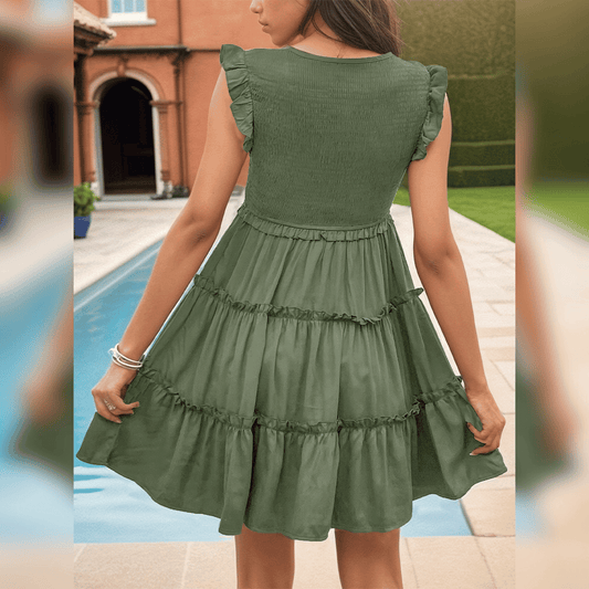 JO | Relaxed green mini dress with tiers for your summer vacation